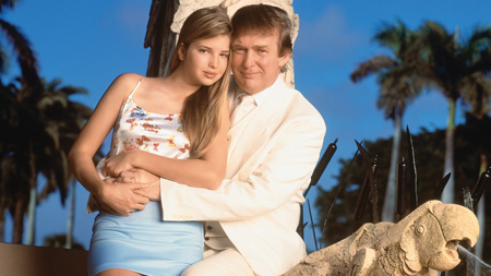 Ivanka Trump sitting on Donald's lap.